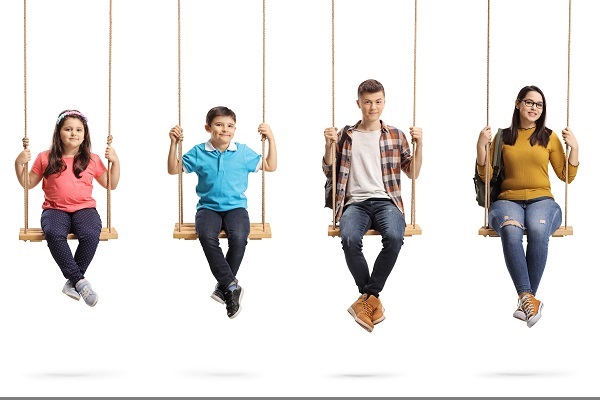 4 children on swings