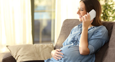 Pregnant woman on the phone